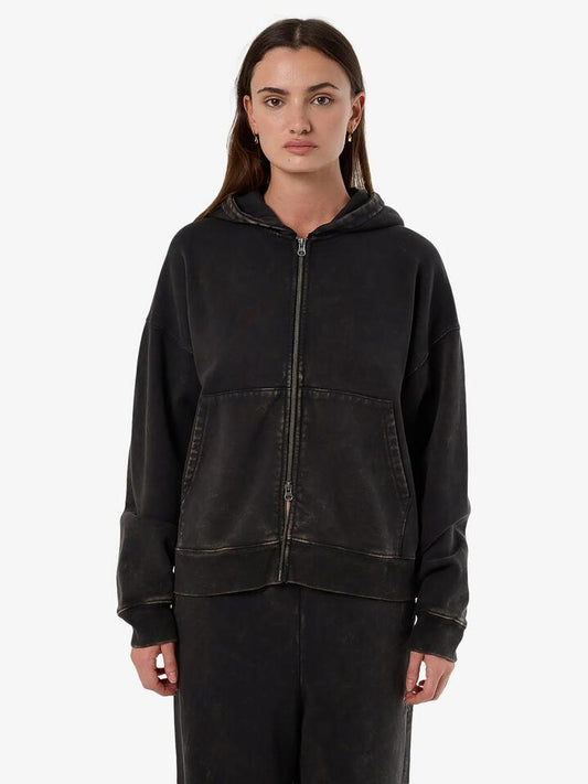 Image of a model wearing Outerwear. Productname: Thrills Dissolve Zip Hood Fleece in Soot colour by brand - Thrills