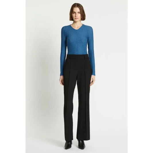 Image of a model wearing Pants. Productname: Baroque Pant in Black colour by brand - sass and bide