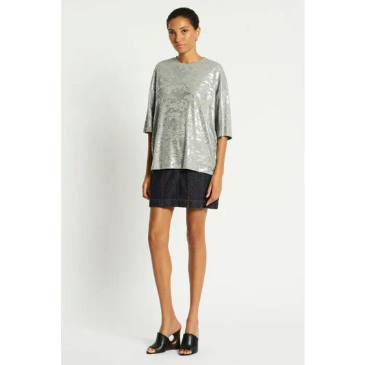 Image of a model wearing Tops. Productname: Glaze Logo Tee in GREY MARLE WITH SILVER FOIL colour by brand - sass and bide