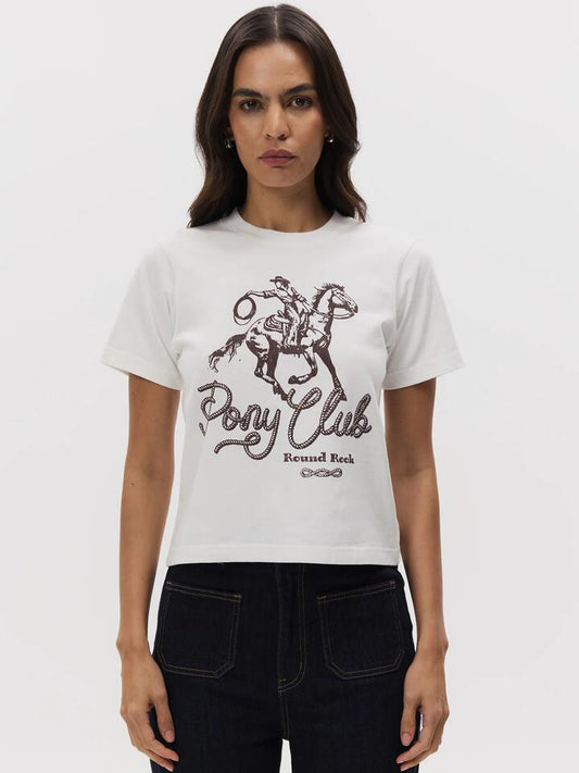 Image of a model wearing Tops. Productname: Lulu & Rose Pony Club Baby Tee in OFF WHITE colour by brand - Lulu & Rose