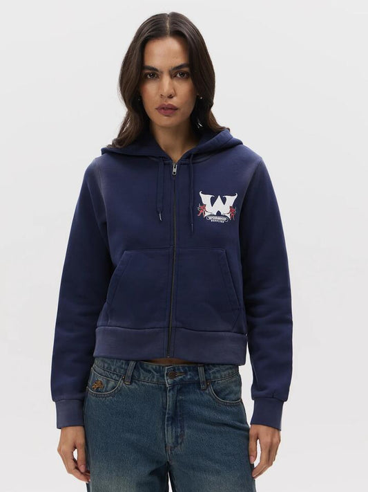 Image of a model wearing Outerwear. Productname: Worship Alt State Zip Through Crop Hood in Black Iris Fade colour by brand - Worship