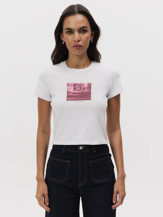 Image of a model wearing Tops. Productname: Thrills Future Leap Mini Tee in WHITE colour by brand - Thrills