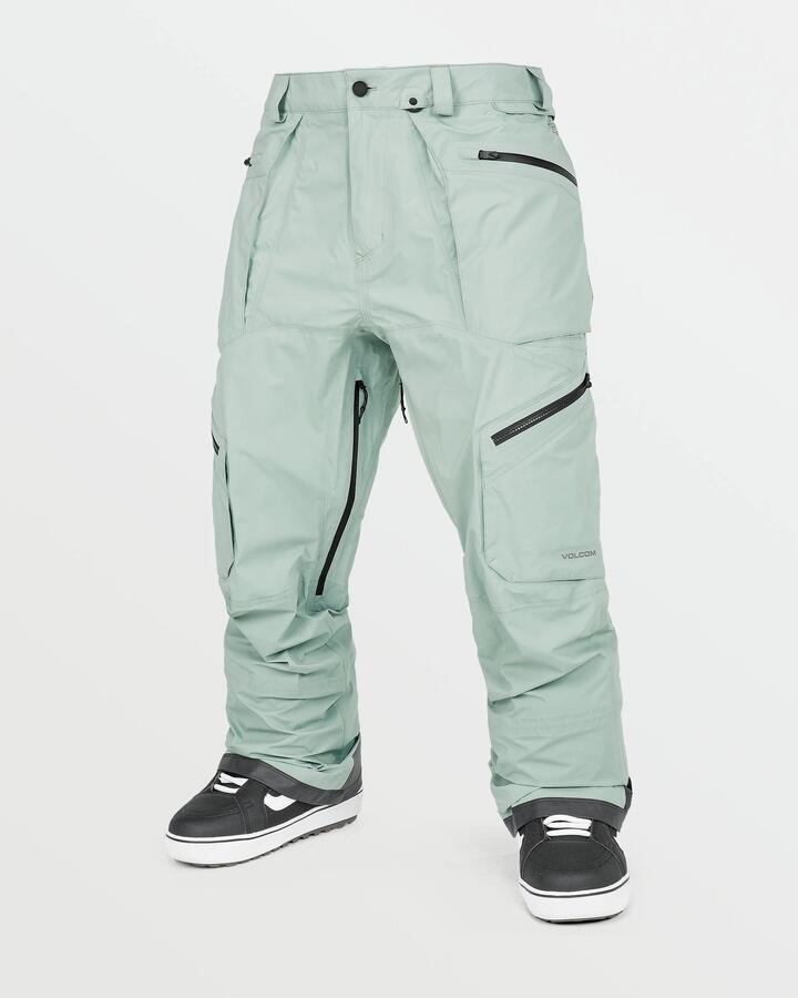 Image of a model wearing Pants. Product name - Volcom Mens Guch Stretch Gore-Tex Snow Pants Agave in Agave colour by brand - Volcom