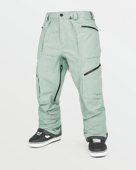 Image of a model wearing Pants. Product name - Volcom Mens Guch Stretch Gore-Tex Snow Pants Agave in Agave colour by brand - Volcom