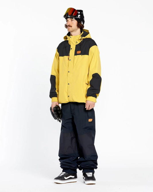Image of a model wearing Outerwear. Productname: Volcom Mens Rnge Gore-Tex Snow Jacket Dark Yellow - in Dark Yellow colour by brand - Volcom