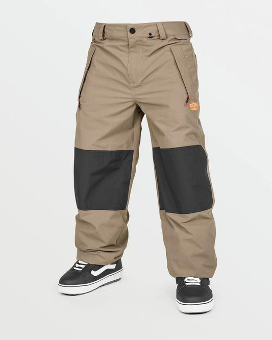Image of a model wearing Pants. Product name - Volcom Mens Longo Gore-Tex Snow Pants Chestnut Brown in Chestnut Brown colour by brand - Volcom