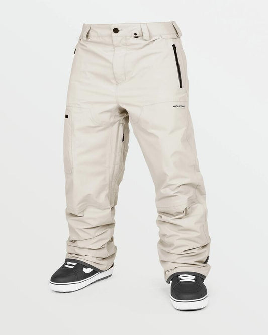 Image of a model wearing Pants. Productname: Volcom Mens L Gore-Tex Snow Pants Stone - in Stone colour by brand - Volcom