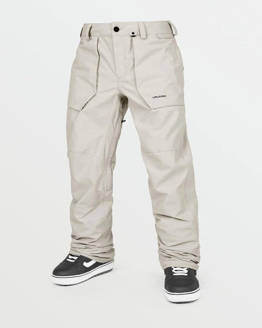 Image of a model wearing Pants. Productname: Volcom Mens Roan Snow Pants Stone - in Stone colour by brand - Volcom
