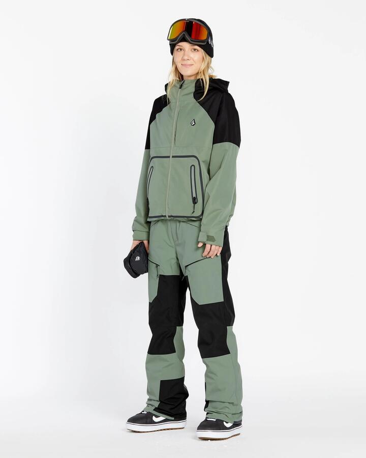 Image of a model wearing Pants. Productname: Volcom - Womens Stone Mica 20K Snow Pants - Lichen Green - in Lichen Green colour by brand - Volcom