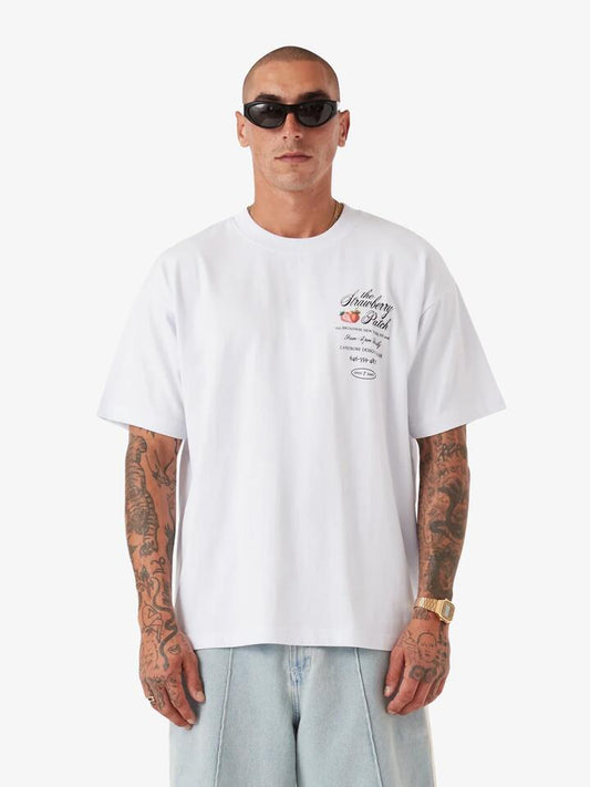Image of a model wearing Denim. Productname: Zanerobe Strawberry Box T - White in WHITE colour by brand - Zanerobe