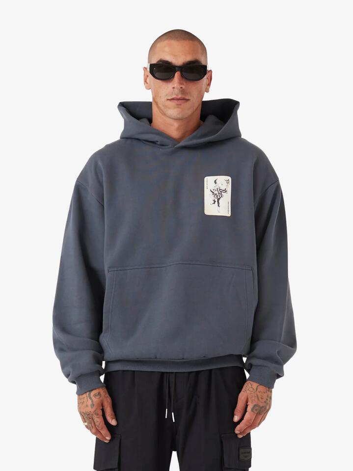 Image of a model wearing Outerwear. Productname: Zanerobe Joker Box Hood in Anchor colour by brand - Zanerobe