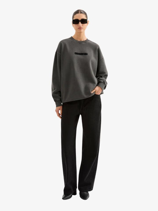 Image of a model wearing Outerwear. Productname: Nude Lucy Nude Lucy Oversized Sweat in Washed Black colour by brand - Nude Lucy