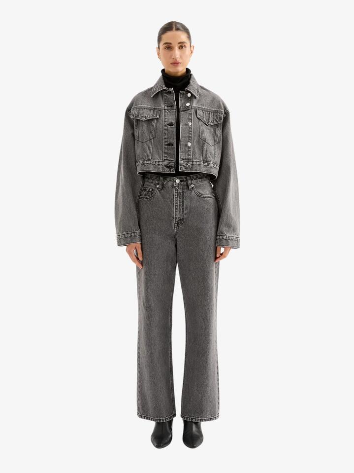 Image of a model wearing Denim. Productname: Nude Lucy Organic Denim Crop Jacket in Graphite colour by brand - Nude Lucy