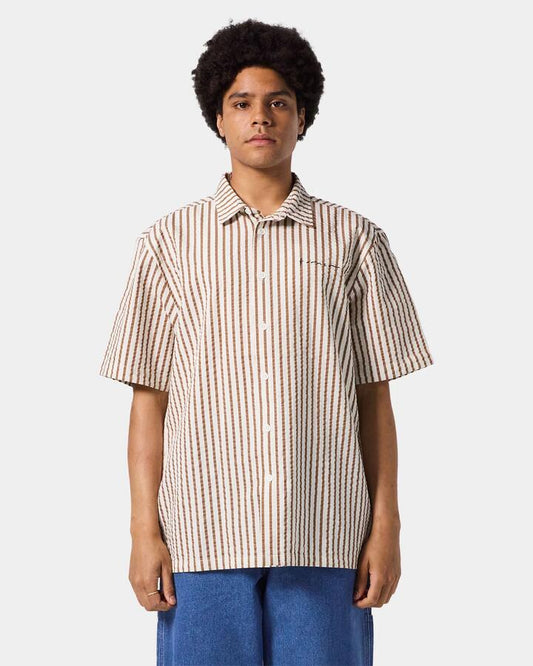 Image of a model wearing Tops. Productname: Former - Mens Vivian Seersucker Short Sleeve Shirt - Copper - in Copper colour by brand - Former