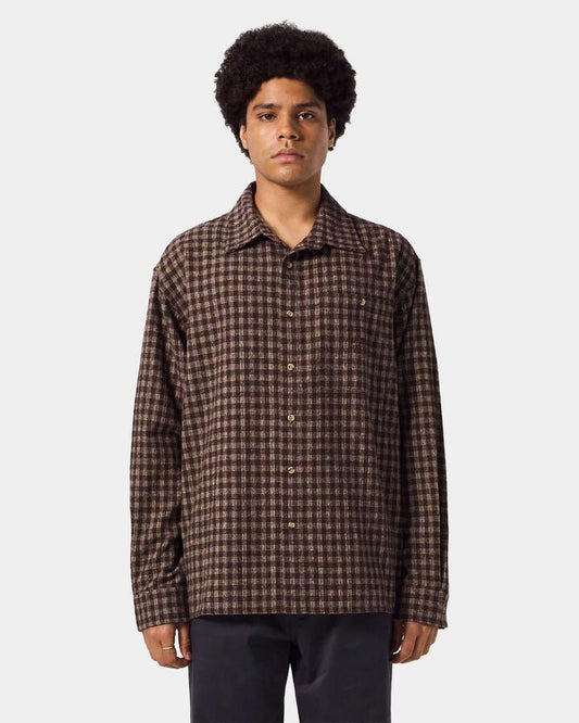 Image of a model wearing Tops. Product name - Former Mens Marquee Flannel Long Sleeve Shirt Brown in Brown colour by brand - Former