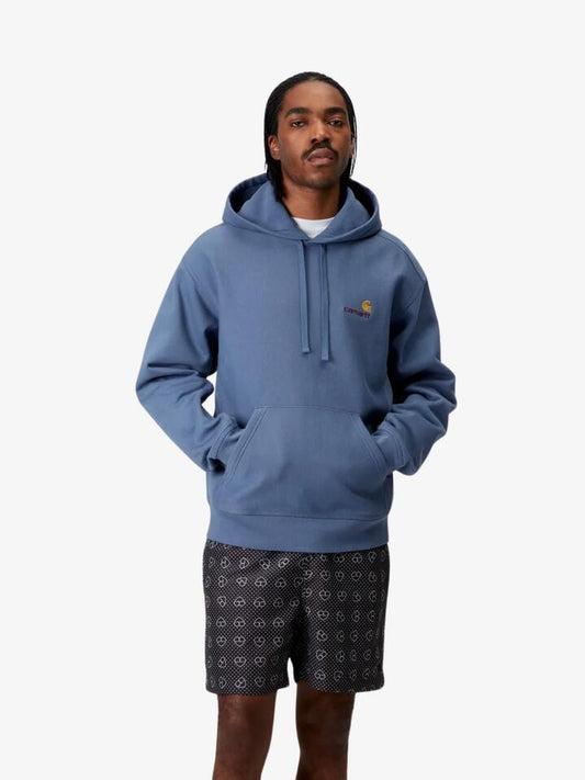 Image of a model wearing Outerwear. Productname: Carhartt Wip Hooded American Script Sweat in Blue Iris colour by brand - Carhartt Wip