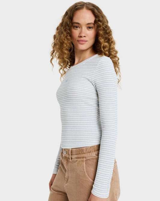 Image of a model wearing Tops. Productname: Roxy Womens Spellbound Stripes Long Sleeve T-Shirt Egret Spellbound Stripe - in Egret Spellbound Stripe colour by brand - Roxy