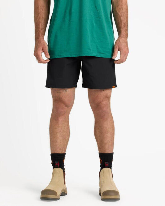 Image of a model wearing Shorts. Productname: Volcom - Mens Rack Ii Hybrid Shorts - Black - in Black colour by brand - Volcom
