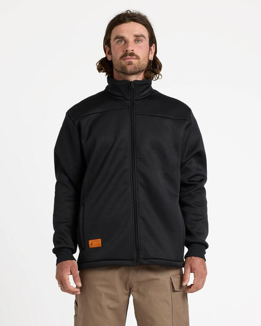 Image of a model wearing Uniforms & Workwear. Productname: Volcom - Mens Workwear Bonded Fleece Jacket - Black - in Black colour by brand - Volcom