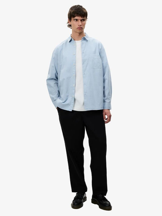 Image of a model wearing Pants. Productname: Article One Baker Pant in Charcoal colour by brand - Article One