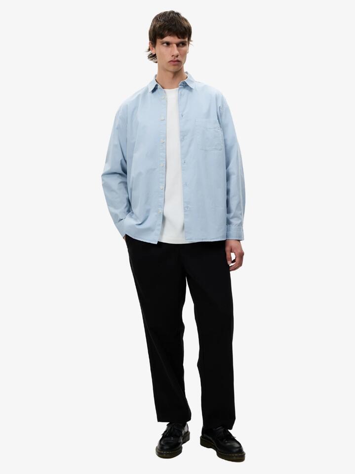 Image of a model wearing Pants. Productname: Article One Baker Pant in Charcoal colour by brand - Article One