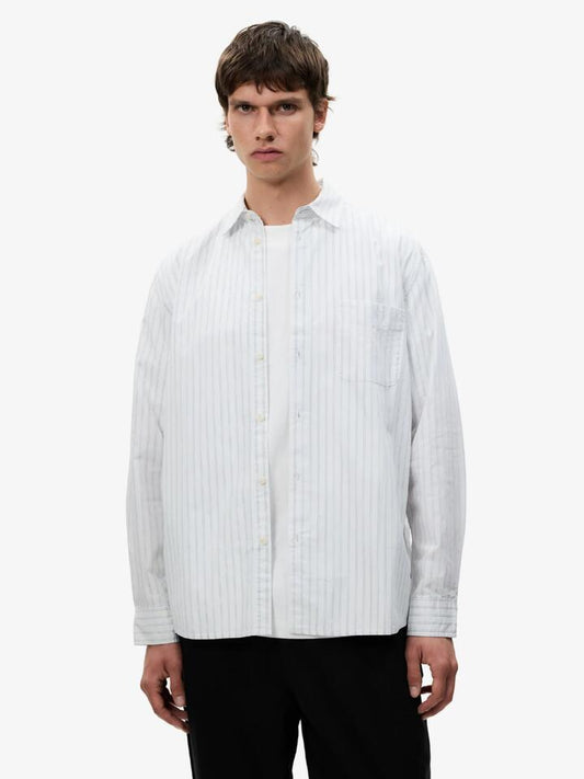 Image of a model wearing Tops. Productname: Article One Martin Poplin Shirt in Navy White colour by brand - Article One