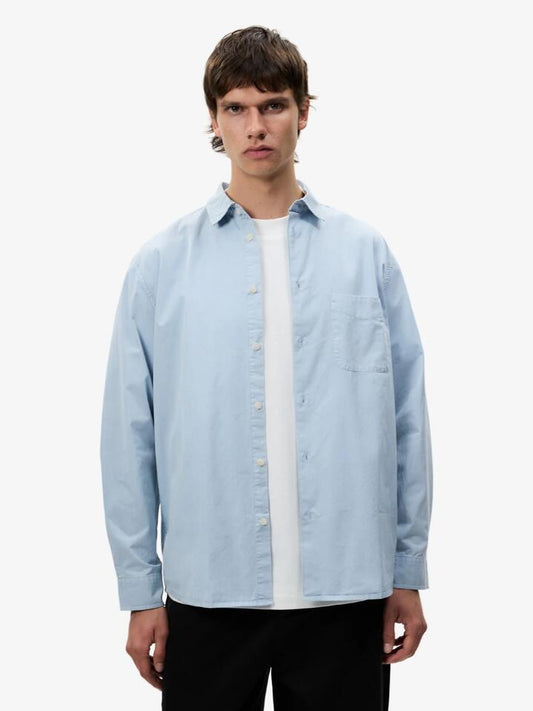 Image of a model wearing Tops. Productname: Article One Martin Washed Twill Shirt in WASHED BLUE colour by brand - Article One