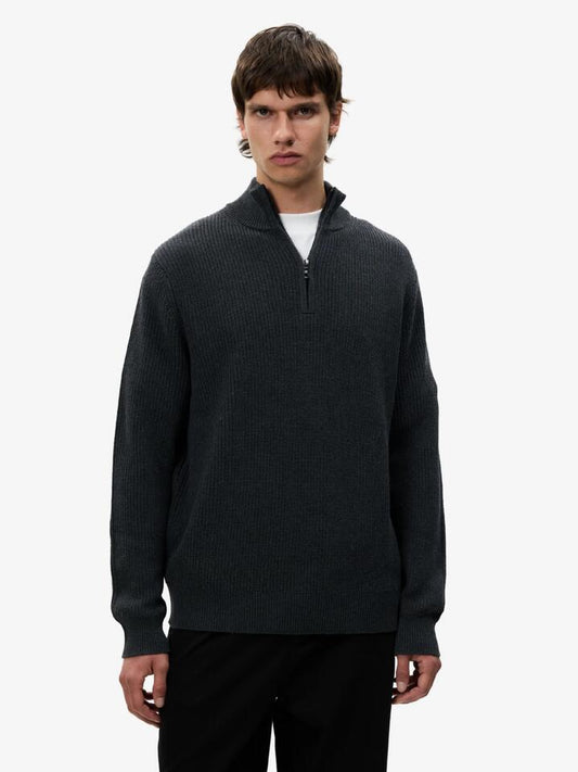 Image of a model wearing Outerwear. Productname: Article One Rib Quarter Zip Sweater in Charcoal colour by brand - Article One