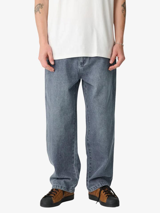 Image of a model wearing Denim. Productname: Xlarge Bull Denim 91 Pant in Ash Blue colour by brand - Xlarge