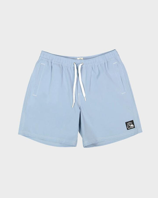 Image of a model wearing Shorts. Product name - Quiksilver Mens Original Volley 17" Swim Shorts Ashley Blue - in Ashley Blue colour by brand - Quiksilver