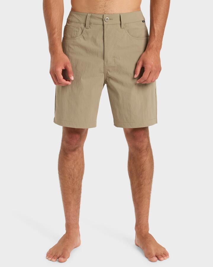 Image of a model wearing Shorts. Product name - Quiksilver Mens Nelson 18" Hybrid Shorts Fallen Rock in Fallen Rock colour by brand - Quiksilver