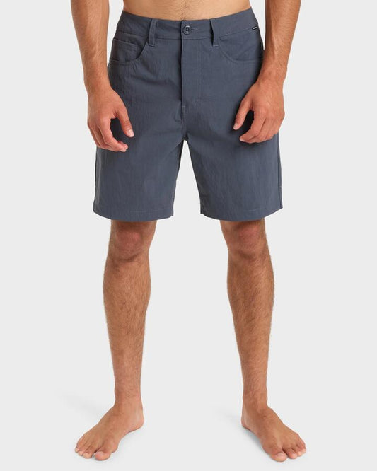 Image of a model wearing Shorts. Productname: Quiksilver Mens Nelson 18" Hybrid Shorts India Ink - in India Ink colour by brand - Quiksilver