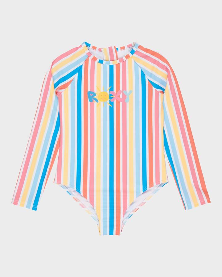Image of a model wearing Tops. Product name - Roxy Girls 2-7 Holly Stripe Long Sleeve Onesie Rash Vest Bright White Holy Stripe in Bright White Holy Stripe colour by brand - Roxy