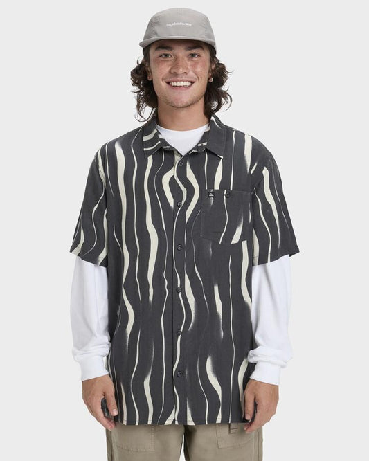 Image of a model wearing Tops. Productname: Quiksilver - Mens Safe Paradise Short Sleeve Shirt - Tarmac Sand Strokes - in Tarmac Sand Strokes colour by brand - Quiksilver