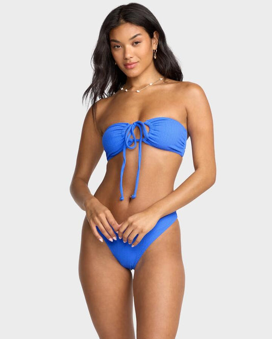 Image of a model wearing Tops. Productname: Billabong Womens Sunrays Drew Bandeau Bikiin Top Tidal Blue - in Tidal Blue colour by brand - Billabong
