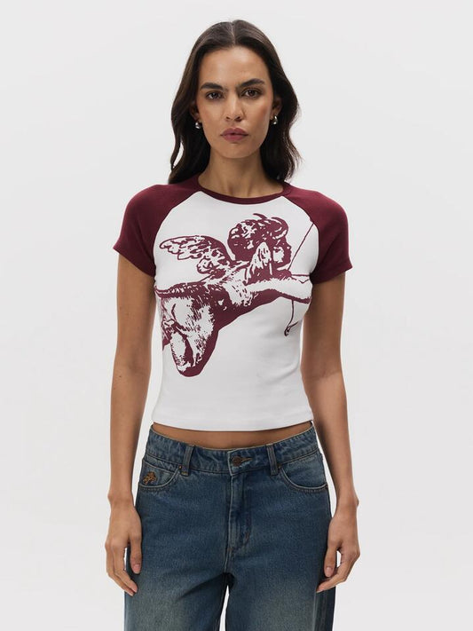 Image of a model wearing Tops. Productname: Worship Cherub Y2k Raglan Tee in WHITE/WINE colour by brand - Worship
