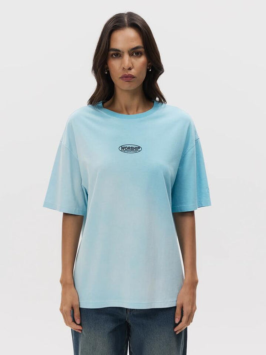 Image of a model wearing Tops. Productname: Worship Fresh Air Relaxed Fit Tee in BLUE MINT OMBRE FADE colour by brand - Worship