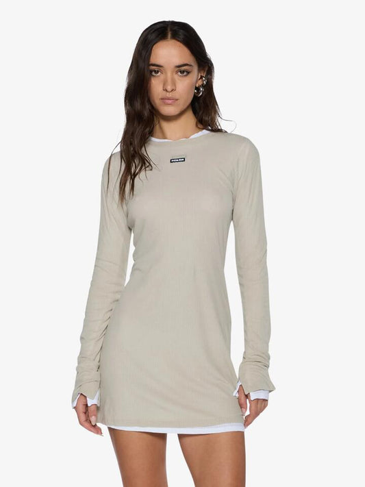 Image of a model wearing Dress. Productname: Ksubi Crawford Long Sleeve Mini Dress in TAUPE colour by brand - Ksubi