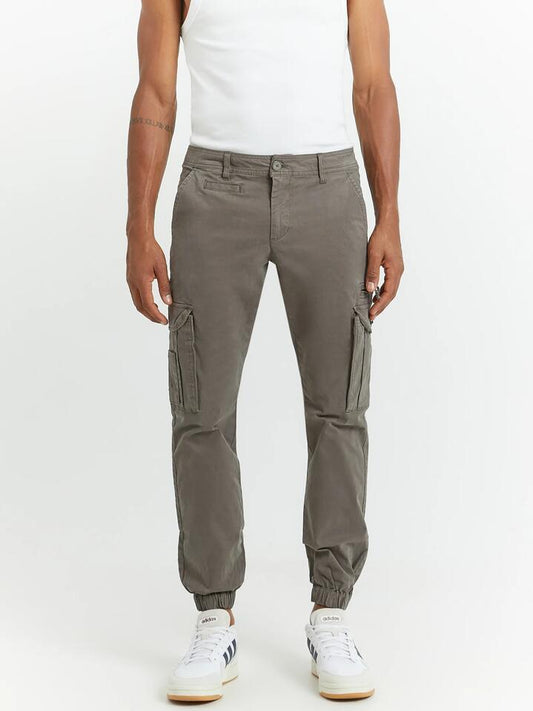 Image of a model wearing Pants. Productname: Henleys Eagle Cargo Pants in Forest colour by brand - Henleys