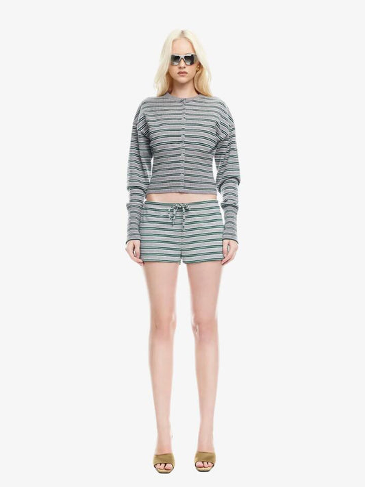 Image of a model wearing Shorts. Productname: Lioness Kourt Bloomers in GREY MOSS colour by brand - Lioness