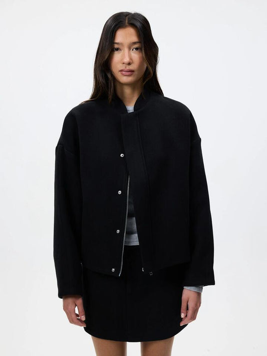 Image of a model wearing Outerwear. Productname: MSE Cocoon Bomber Jacket in Black colour by brand - MSE