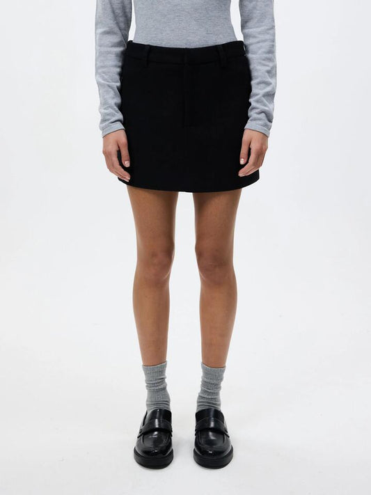 Image of a model wearing Skirts. Productname: MSE Fitted Mini Skirt in Black colour by brand - MSE