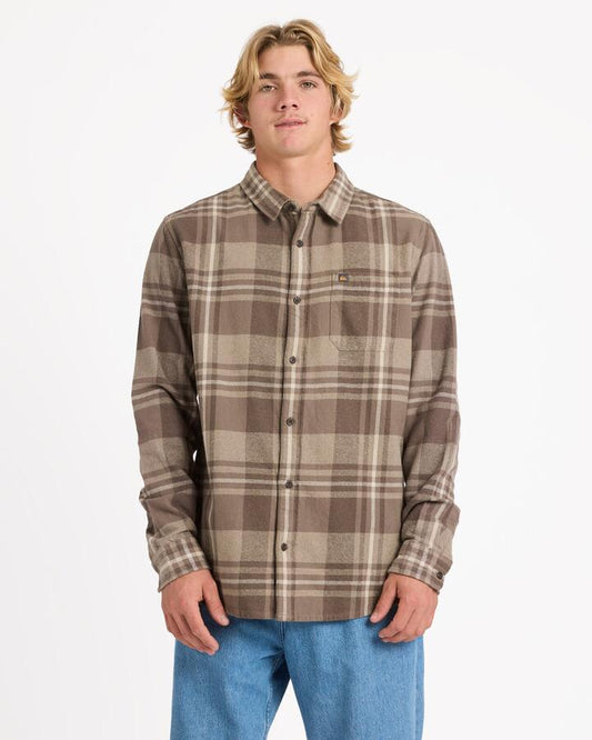 Image of a model wearing Tops. Productname: Quiksilver Mens Scribe Plaid Long Sleeve Shirt Seneca Rock Scribe Plaid - in Seneca Rock Scribe Plaid colour by brand - Quiksilver