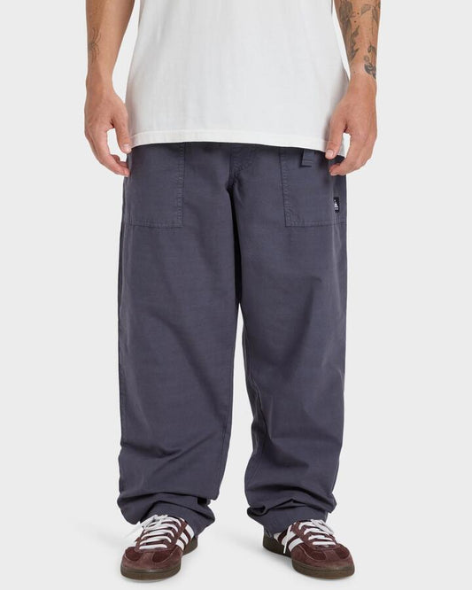Image of a model wearing Pants. Productname: Quiksilver Mens Double Croen Pants India Ink - in India Ink colour by brand - Quiksilver