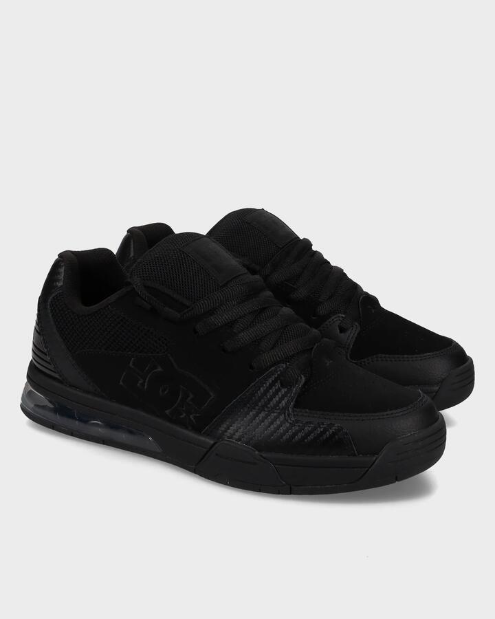 Image of Shoes. Product name - DC Shoes Mens Versatile Skate Shoes Black/Black/Black in Black/Black/Black colour by brand - DC Shoes