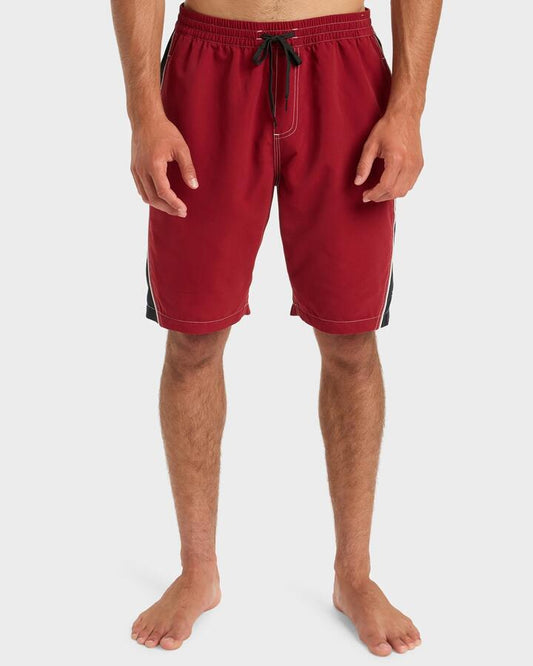 Image of a model wearing Shorts. Productname: Quiksilver - Mens Mercury Volley 20" Swim Shorts - Biking Red - in Biking Red colour by brand - Quiksilver