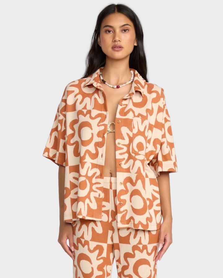 Image of a model wearing Tops. Productname: Billabong Womens Lost Waves Short Sleeve Shirt Sunburnt - in Sunburnt colour by brand - Billabong