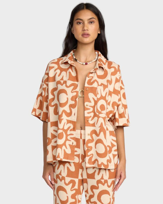 Image of a model wearing Tops. Productname: Billabong Womens Lost Waves Short Sleeve Shirt Sunburnt - in Sunburnt colour by brand - Billabong