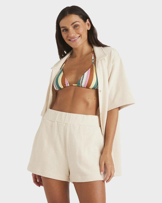 Image of a model wearing Shorts. Product name - Roxy Womens Always Sunny Elastic Waist Shorts Parchment in Parchment colour by brand - Roxy