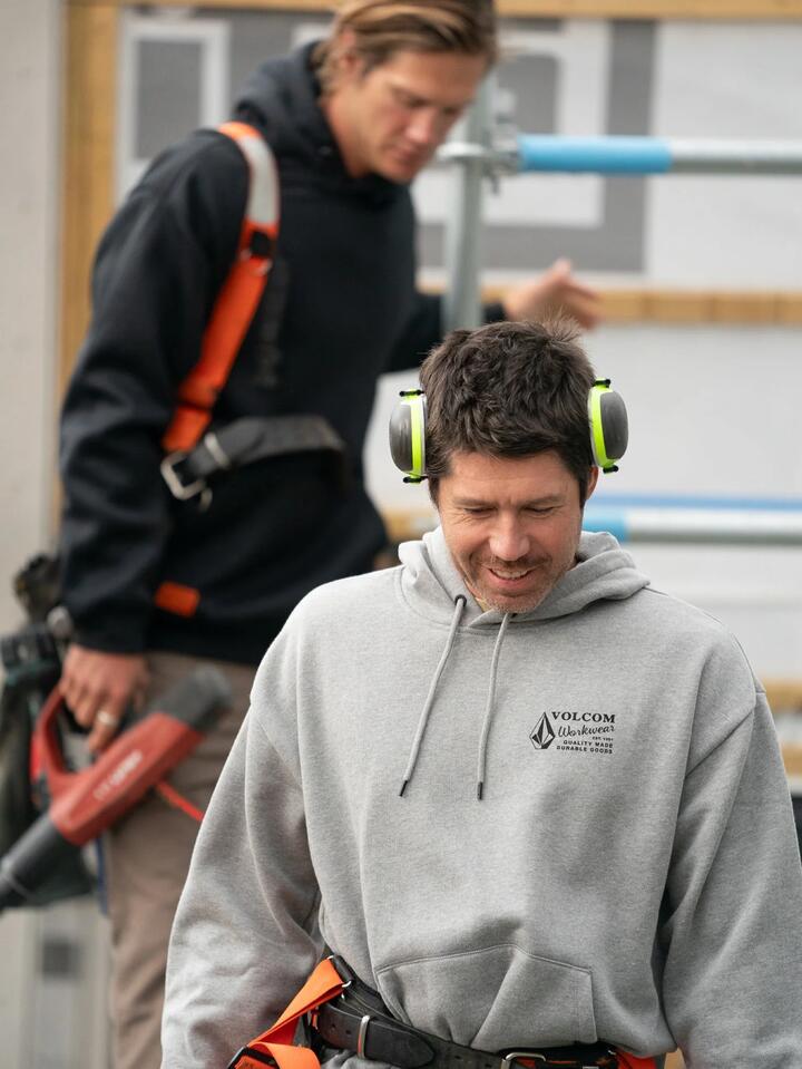 Image of a model wearing Uniforms & Workwear. Productname: Volcom - Mens Workwear Pullover Hoodie - Heather Grey - in Heather Grey colour by brand - Volcom